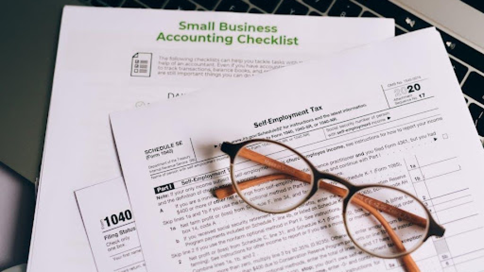 Eye glasses on top of tax documents